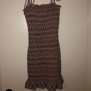 Fitted Storia ruched dress with tie straps!